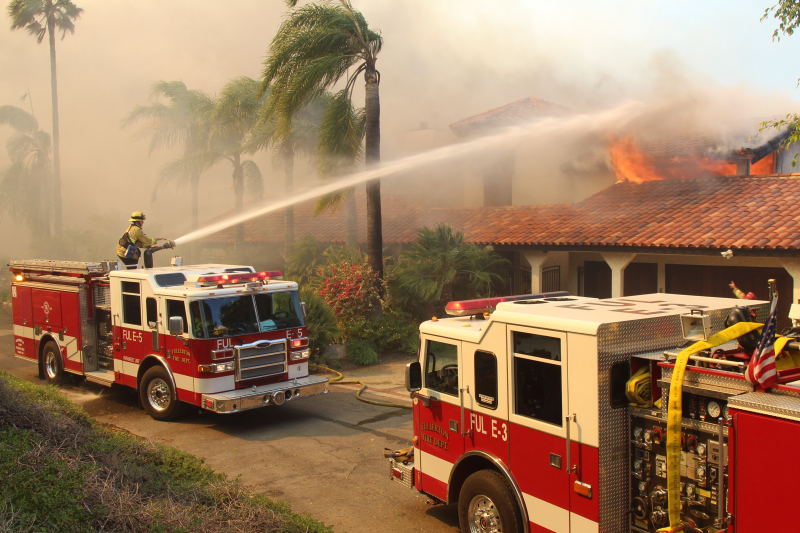 firefighters put out a house fire